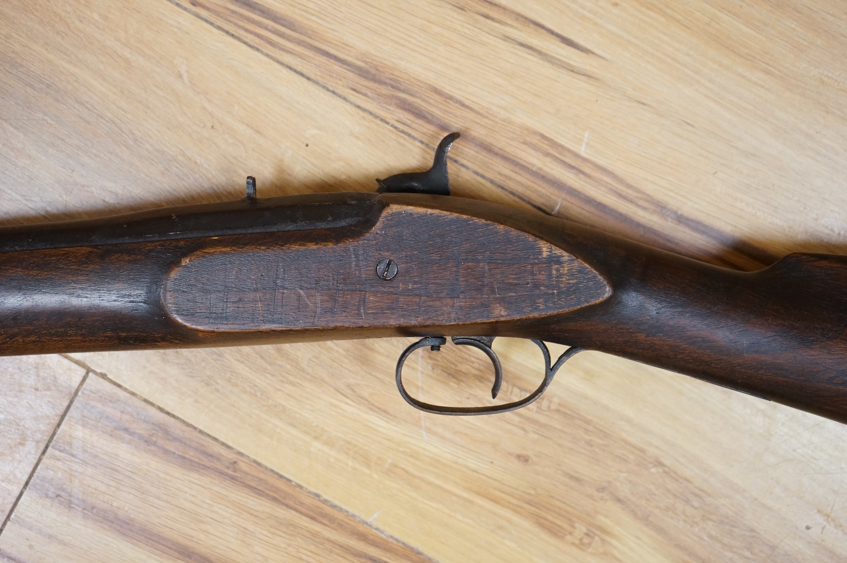 An Indian military style percussion musket, barrel 96cm, the overall length 135cm, with military style mounts and lock, although the barrel has some age the stock and furniture is later